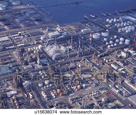 Aerial view of towers and industrial plant View Large Photo Image Picture - Aerial view of towers and industrial plant. Fotosearch