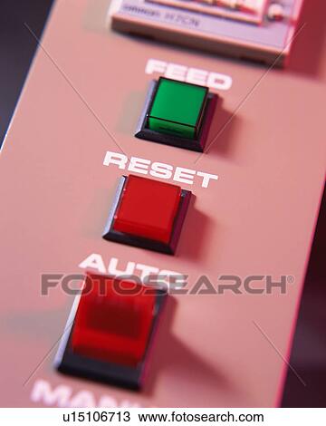 Stock Image - Close up of buttons bearing different functions. Fotosearch