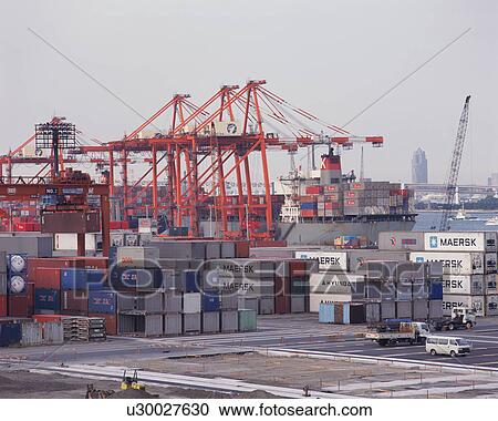 Huge cranes and containers at dock View Large Photo Image Stock Image - Huge cranes and containers at dock. Fotosearch