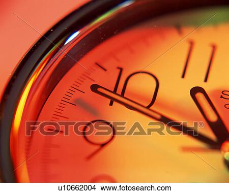 Picture - Close up of an analog clock. Fotosearch