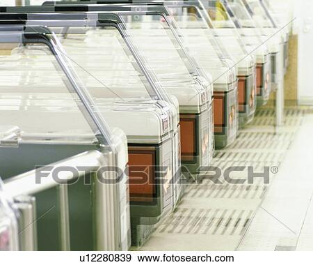 Side view of entrance at train station View Large Photo Image Stock Photo - Side view of entrance at train station. Fotosearch