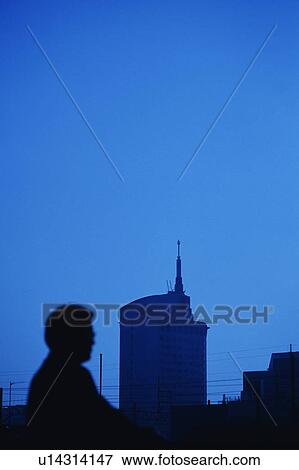 Blurred view of a mature man at the foreground with building at the back View Large Photo Image Stock Photo - Blurred view of a mature man at the foreground with building at the back. Fotosearch
