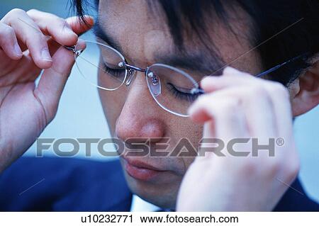 Stock Image - Portrait of a man in spectacles. Fotosearch