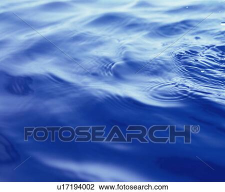 Placid water surface View Large Photo Image Stock Image - Placid water surface. Fotosearch