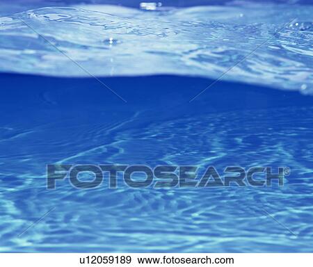 Stock Photo - Placid water surface. Fotosearch