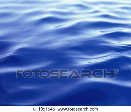 Stock Photography - Placid water surface. Fotosearch