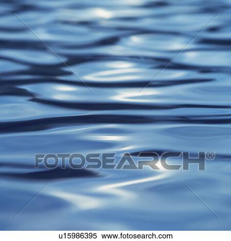 Ripples on water surface View Large Photo Image Stock Photography - Ripples on water surface. Fotosearch