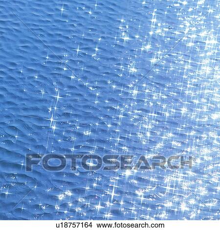 Sunlight reflected on water surface View Large Photo Image Picture - Sunlight reflected on water surface. Fotosearch