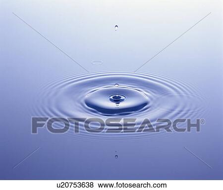 Stock Photo - Water droplet falling on surface of water . Fotosearch