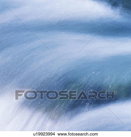 Water flowing rapidly in stream View Large Photo Image Picture - Water flowing rapidly in stream. Fotosearch