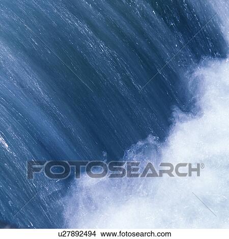 Water flowing rapidly in stream View Large Photo Image Picture - Water flowing rapidly in stream. Fotosearch