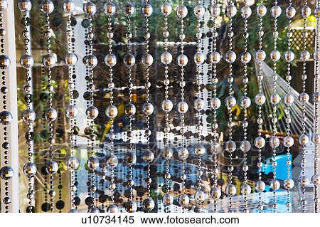 Bead Curtains in Front of Window View Large Photo Image Stock Photography - Bead Curtains in Front of Window. Fotosearch