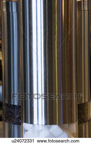 Stock Image - Chrome canister in a kitchen. Fotosearch