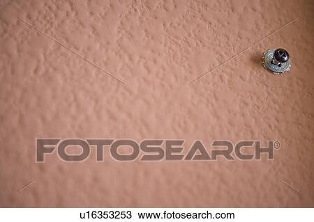 Close up of pink wall, with a screw dry wall anchor View Large Photo Image Stock Image - Close up of pink wall, with a screw dry wall anchor. Fotosearch