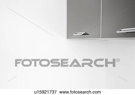 Stock Photo - Detail of modern kitchen cabinets. Fotosearch