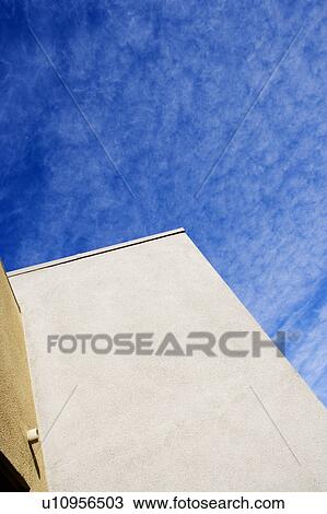 Exterior Detail of Contemporary Stucco Wall against Blue Sky View Large Photo Image Stock Image - Exterior Detail of Contemporary Stucco Wall against Blue Sky. Fotosearch