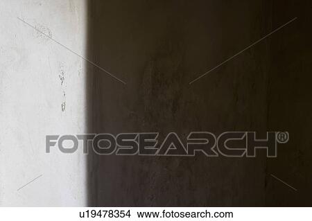 Lit surface of wall with contrasting shadow side View Large Photo Image Picture - Lit surface of wall with contrasting shadow side. Fotosearch