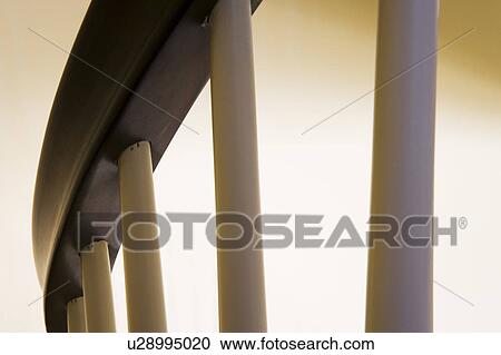 Stock Image - White Wood Railing and Dark Wood Bannister. Fotosearch