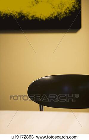 Stock Image - Dining Chair and Painting. Fotosearch