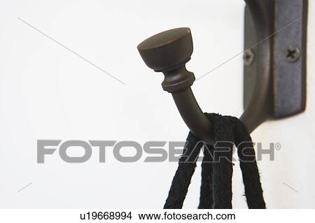 Picture - Hook Holding Rope Handles of Bag. Fotosearch