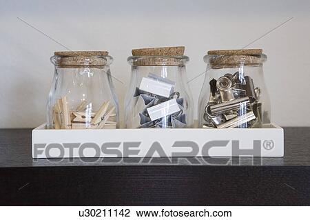Three jars with clothes pins and metal clips View Large Photo Image Stock Image - Three jars with clothes pins and metal clips. Fotosearch