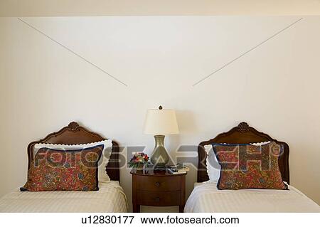 Twin Beds with Ornate Wood Headboards View Large Photo Image Stock Photo - Twin Beds with Ornate Wood Headboards. Fotosearch