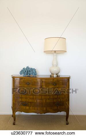Stock Photo - Wood Dresser and Lamp. Fotosearch