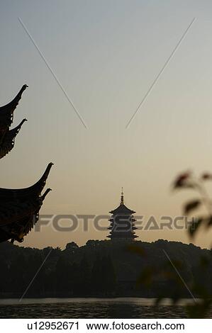 Stock Image - The Six Harmonies Pagoda, West Lake in Hangzhou, Zhejiang Province, People Republic of China. Fotosearch