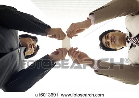 Stock Image - Business card exchange. Fotosearch