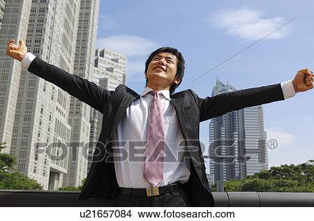 Picture - Businessman stretching. Fotosearch