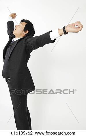 Stock Image - Businessman stretching. Fotosearch