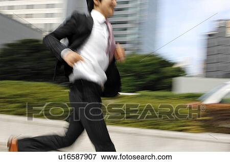 Stock Photo - Businessman who runs. Fotosearch