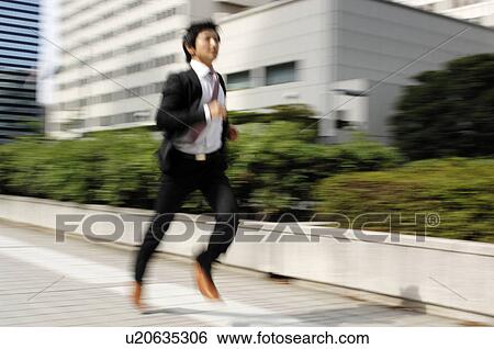 Stock Photograph - Businessman who runs. Fotosearch