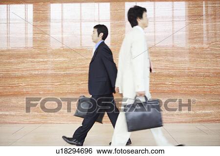 Stock Photograph - Businessmen intersecting each other. Fotosearch