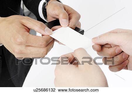 Hand of businessman exchanging business card View Large Photo Image Stock Image - Hand of businessman exchanging business card. Fotosearch