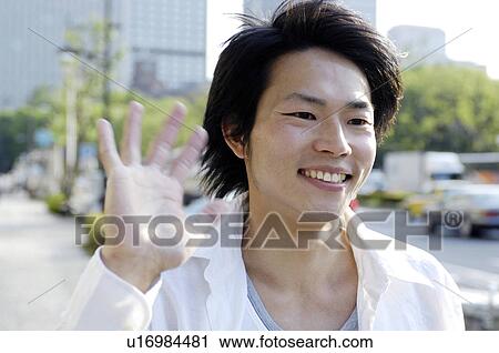 Man who waves a hand to the sweetheart View Large Photo Image Stock Image - Man who waves a hand to the sweetheart. Fotosearch