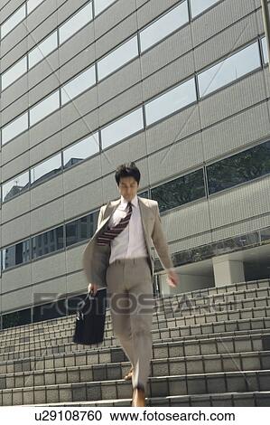 Office worker going out View Large Photo Image Stock Image - Office worker going out. Fotosearch