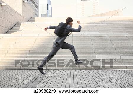 Office worker who runs View Large Photo Image Stock Photo - Office worker who runs. Fotosearch
