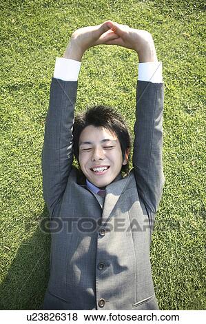 Relaxing office worker View Large Photo Image Stock Photo - Relaxing office worker. Fotosearch