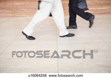 Stock Photo - The step of businessmen. Fotosearch