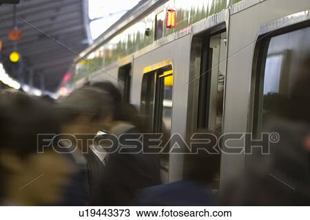 People boarding a train View Large Photo Image Stock Image - People boarding a train. Fotosearch