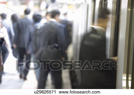 People boarding a train View Large Photo Image Stock Image - People boarding a train. Fotosearch