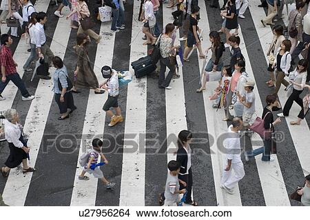Picture - People crossing street in Japan. Fotosearch