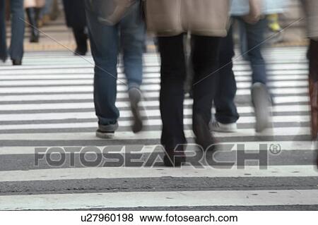 People crossing street in Japan View Large Photo Image Stock Photo - People crossing street in Japan. Fotosearch