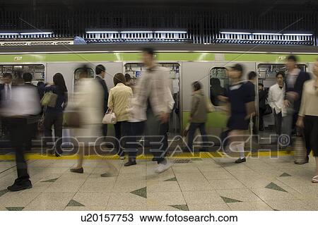 People walking in a station View Large Photo Image Stock Image - People walking in a station. Fotosearch