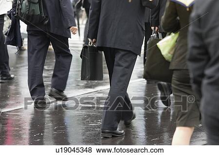 People walking in street View Large Photo Image Stock Photo - People walking in street. Fotosearch