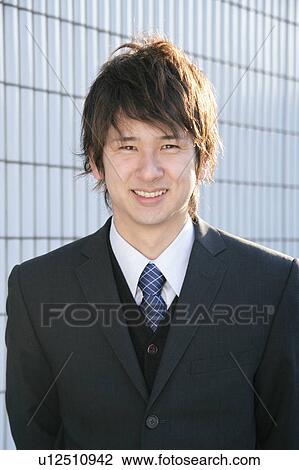 Portrait of a young business man View Large Photo Image Stock Image - Portrait of a young business man. Fotosearch
