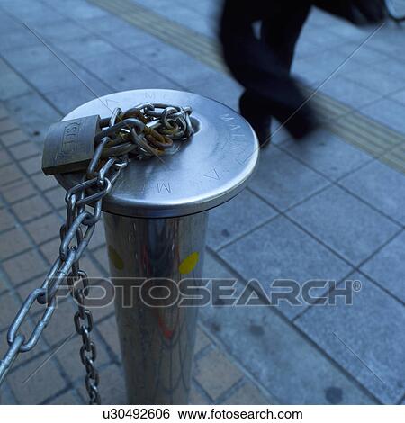 Chain link pole, close-up View Large Photo Image Stock Photograph - Chain link pole, close-up. Fotosearch