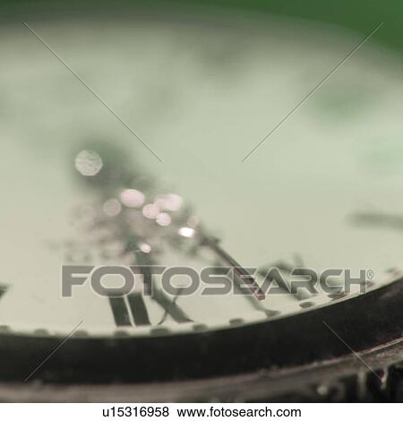Stock Photo - Clock, close-up. Fotosearch