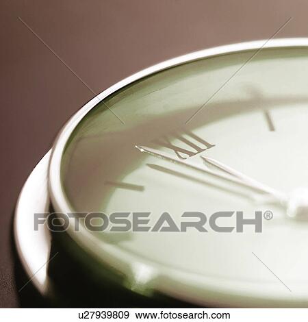 Stock Photo - Clock, close-up. Fotosearch